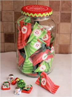 a jar filled with candy sitting on top of a counter