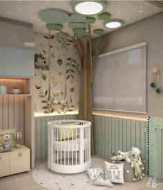 a baby's room is decorated in pastel colors and features a tree mural