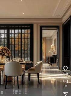 an elegant dining room with black and white decor