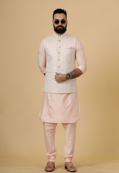 Important Instrucitons : We request you to kindly calculate the processing time of your order  after the mutual confirmation on Bespoke measurements between us has taken place (either via message , e mail or form) "Crafted with Passion in India; loved by men across the USA, Canada, Europe" Product Specifications : Material: Thread Embroidered Silk Color: Peach Jacket with Peach Kurta Payjama Collar type: Mandarin Jawahar Jacket With 6 Buttons in Front Package contents: 1 Half Jodhpuri Jacket + 1 Pink Nehru Jacket For Festive Occasions, Designer Pink Nehru Jacket With Zari Work, Festive Pink Nehru Jacket With Resham Embroidery, Navratri Designer Nehru Jacket With Dori Work, Festive Pink Nehru Jacket Straight Kurta, Festive Pink Chanderi Nehru Jacket, Fitted Bollywood Style Pink Nehru Jacket, Pink Bandhgala With Chikankari Embroidery, Bollywood Style Pink Nehru Jacket With Resham Embroidery