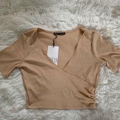 New With Tags!!! Super Cute, Never Worn. Gift From My Sister Lol :P Zara Beige V-neck Top, Beige V-neck Top By Zara, Trendy Beige Zara Tops, Brown V-neck Crop Top For Spring, Zara Trendy V-neck Crop Top, Zara Brown Top For Day Out, Brown Short Sleeve Crop Top For Spring, Spring Brown Short Sleeve Crop Top, Zara Fitted Brown Tops