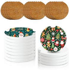 the cork coasters are decorated with christmas decorations