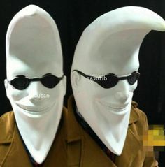 two white mannequin heads wearing sunglasses