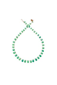 This captivating necklace is designed with finely cut chrysoprase, whose vibrant shades of green symbolize renewal and growth. Each stone, in the shape of a smooth drop, is carefully arranged. Chrysoprase is known for its properties of strengthening self-confidence and promoting inner truth. The stones are mounted on a delicate copper-colored nylon cord, and the necklace closes with a 14K gold filled clasp, adding a touch of lasting sophistication. Features : Stone : Chrysoprase 'drop' shape, 6x4 to 11x8 mm ~65 caratsLength : 44 cm or 48 cmCord : Silky nylon, copper colored.Clasp : 'Infinity' Gold 14K gold-filled Found Art, Boot Bag, Map Painting, Linen Placemats, Map Art, Self Confidence, Accessories Bracelets, Shades Of Green, Vintage Decor