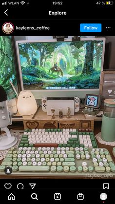 a computer keyboard sitting on top of a wooden desk next to a monitor and mouse