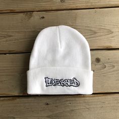 Stay warm, add style to your look and spark Kingdom conversations with our Blessed beanie! One-size Cotton Hat For Streetwear, White Beanie Hats For Streetwear, One Size Cotton Hat For Streetwear, Casual White Hat For Fall, White Beanie For Streetwear, Fitted White Snapback Hat, White Casual Beanie For Streetwear, Trendy White Beanie One Size, White Beanie For Winter Streetwear