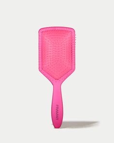 Pinky Swear - Paddle Brush flexible bristles - large paddle size - matte pink Tangles? Never heard of her!  Tell me more:  Your favorite paddle detangle brush in hot pink!  WHY YOU NEED IT:  Brush through wet or dry hair with ease.   Cover more surface area with larger paddle brush head.  Effortlessly detangles even the most stubborn knots pain free.  Ideal for all hair types. Extension and wig friendly.  *Not for use with blow dryer    Framar Pink Paddle Brush, Detangling Brush, Curly Hair Brush Curly Hair, Wet Hair Brush, Best Detangling Brush, Detangle Brush, Curly Hair Brush, Pinky Swear, Paddle Brush, Detangling Brush, Matte Pink