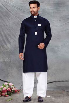 Product Features: Top Color: Navy Blue Bottom Color: White Work: Solid Top Fabric: Fine poly and cotton mix Bottom Fabric: Fine poly and cotton mix Pack Of: 1 Kurta : 1 Salwar Occasion: Partywear Disclaimer: There will be slight difference in digital to actual image Navy Cotton Sets For Spring, Spring Indigo Cotton Kurta, Long Sleeve Cotton Tops For Eid, Casual Cotton Tops For Eid, Blue Cotton Sets For Spring, Long Sleeve Blue Tops For Eid, Blue Cotton Winter Sets, Winter Cotton Blue Sets, Spring Blue Cotton Sets