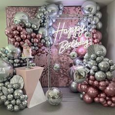 a birthday party with balloons and decorations