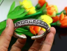 "92.5% pure silver handmade excellent unisex bangle bracelet kada, amazing Divine lord Shiva \"om namah shivay\" Mantra kada, best customized chitai work unisex personalized gift from India, Metal-925 sterling silver. Item type-Bangle bracelet. Weight-43.00 grams width-1.1 cm size- 2-6 or 6. centimeter inner diameter or 2.375\" stamped-925 Finish-oxidized. makes excellent gifting for birthday, mother's day, wedding anniversary, valentines day, Christmas day" Symbolic Festival Bangle Bracelet, Handmade Silver Bangle For Puja, Spiritual Silver Bracelets For Navratri, Spiritual Oxidized Finish Bracelets For Festivals, Spiritual Oxidized Bracelets For Festivals, Spiritual Bracelets With Oxidized Finish For Festivals, Symbolic Silver Bangle For Festivals, Adjustable Oxidized Cuff Bracelet For Festivals, Spiritual Silver Cuff Bracelet For Festivals