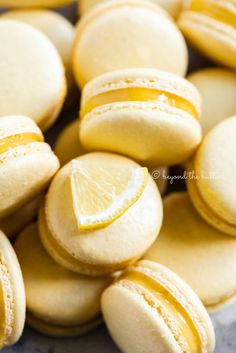 lemon bar macarons with homemade lemon curd filling are the perfect dessert for summer