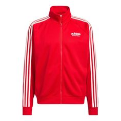 a red adidas jacket with white stripes