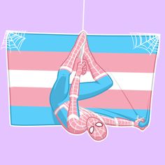 a spider - man hanging upside down on a pink and blue striped rug with his hands in the air