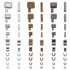 several different types of metal clips on a white background