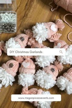 crocheted christmas garlands with pom poms and beads on the floor