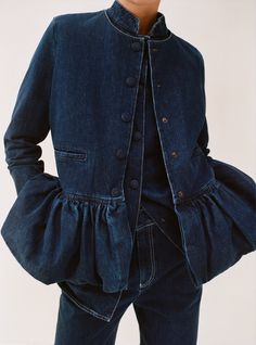 Denim Peplum Jacket in Dark Blue: ﻿Statement jacket made with sustainably sourced cotton and featuring a gathered peplum and welt pockets. Pair it with a matching vera mini skirt. 100% Cotton Denim No Lining 5 Button Opening 2 Welt Pockets Style ID JKT3DB Made In London Size and Fit: XS-S-M-L-XL Model measures 1m70/5"57 and is wearing a size XS Fits small to size, take one size larger than normal Cropped sleeve length Internal shoulder pads Mid-weight, non-stretchy fabric Product Measurements: S Statement Jacket, Dad Sneakers, Peplum Jacket, Cropped Jacket, Casual Denim, Crop Jacket, Fashion Details, Jeans Denim, Jacket Outfits