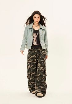 Embrace the essence of street style with our Camouflage Cargo Trousers, featuring bold double side belt straps for a blend of function and flair. Crafted from a soft yet durable blend of 95% cotton and 5% polyester fiber, these pants are tailored to thrive in your everyday wardrobe rotation. The classic camouflage pattern exudes a retro vibe, while multiple pockets and the loose fit cut ensure they are as practical as they are fashionable. Pair these trousers with a tucked-in basic tee and chunk Spring Combat Cargo Pants For Streetwear, Trendy Camouflage Cargo Pants For Spring, Fitted Camouflage Cargo Pants For Streetwear, Trendy Camouflage Cargo Pants For Streetwear, Spring Military Cargo Pants For Streetwear, Spring Military Style Cargo Pants For Streetwear, Camouflage Full-length Cargo Pants With Pockets, Military Cargo Jeans With Camouflage And Side Pockets, Camouflage Cotton Full-length Cargo Pants