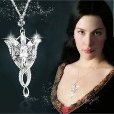 "The Lord Of The Rings" Silver Necklace Of Arwen Evenstar - As Shown By Arwen Undmiel (Actress Liv Tyler) On The Lord Of The Rings Movie. - Beautifully Crafted / Made To The Highest Standards - Condition:100% New And High Quality - Material: Alloy ,Crystal / Silver Plated With Bright Clear Crystals - Silver Stainless Steel Long Chain - Great Gift For Friends, Ladies, Or Fans Of The Lord Of The Rings Series Dimensions: Chain Length: 19.75" Inch Keywords: Lotr , Beautiful , Jewel Jewelry. Evenstar Necklace, Arwen Evenstar, Lord Of The Ring, Rings Silver, Ring Pendant Necklace, Gold Tone Necklace, Crystal Necklace Pendant, The Ring, The Rings