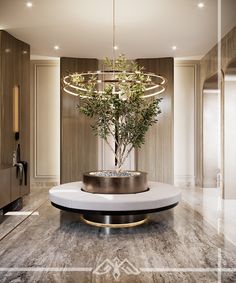 an elegant living room with a tree in the center and marble flooring on the walls