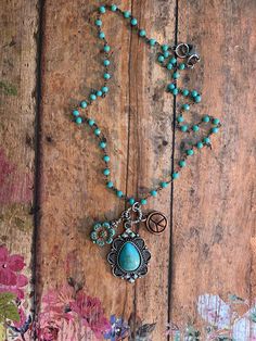 "❤ EveRy DaY WeaR ❤  This DESIGN ~ An array of charms, beads & findings dangle from this 16\" turquoise micro beaded chain. CHARMS selected: Southwestern style drop, czech flower & copper peace sign. jewelry for your heart & soul <-----❤---- NOTE ❤ ---> The listing photos you are seeing are of my original designs. I only change the photos when there is a significant design difference. What this means is, you may receive: a necklace with a different type of bead/charm; a slight difference to the Turquoise Necklace With Lobster Clasp For Jewelry Making, Bohemian Teardrop Beaded Necklaces For Jewelry Making, Bohemian Teardrop Beaded Necklace For Jewelry Making, Bohemian Teardrop Beads For Jewelry Making, Bohemian Beaded Teardrop Turquoise Necklace, Handmade Bohemian Teardrop Turquoise Necklace, Turquoise Beaded Hippie Necklace, Turquoise Hippie Beaded Necklace, Turquoise Hippie Necklace For Jewelry Making