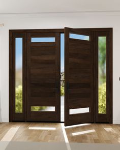 an open wooden door with glass panels on the outside and inside, in front of a white wall