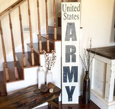 a sign that says army next to some stairs