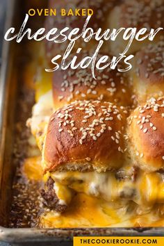 cheeseburger sliders in a baking pan with sesame seeds