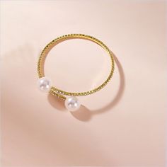 Gender:Women's; Theme:Fashion; Style:Luxury; Jewelry Type:Cuff Bracelet; Occasion:Party Evening Wear,Date,Gift; Material:Alloy; Width:80; Length of Bracelet:6; Design:Fancy; Listing Date:04/16/2024 Gold Metal Pearl Bracelet For Party, Metal Crystal Bracelet For Party, Metal Crystal Bracelet For Parties, Metal Bangle Pearl Bracelet For Party, Party Metal Pearl Bangle Bracelet, Gold Alloy Party Bracelets, Gold Alloy Bracelets For Party, Adjustable Party Bangle, Adjustable Alloy Bracelets For Party