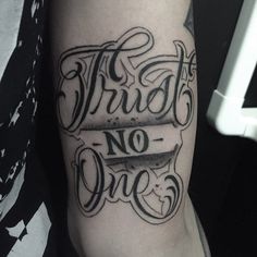 a black and white tattoo with the words bride no one on it's arm