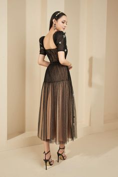 Aniston Pleated Puffy Sleeved Mesh Sheer Dress | MEAN BLVD Tulle Tea Length Evening Dress, Evening Tulle Pleated Dress, Tulle Evening Dress With Short Sleeves, Short Sleeve Tulle Evening Dress, Evening Dress With Lace And Tulle Skirt, Elegant Tulle Midi Dress For Evening, Lace Dress With Tulle Skirt For Evening, Elegant Midi Dress With Tulle Skirt And Fitted Bodice, Spring Evening Mesh Dress With Fitted Bodice