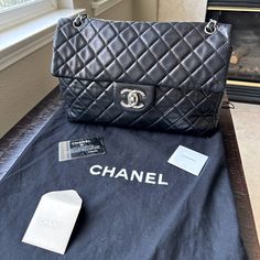 Selling Something Very Special To Me. Authentic Chanel Black Lambskin Purse Style Is Called Sac Class Rabat Comes With Dust Bag, Tissue Paper, Authenticity Card And Felt Fabric To Keep This Beauty In Mint Condition. See Measurements For Size. This Is Not A Common Purse It Is Large And I Honestly Don’t See This On Anyone. Comes In Original Chanel Black Box. Inside Is Superbly Clean. Has Zipper Pocket And An Additional Pocket. Outside Is Also In Good Condition With Small Outer Pocket. The Purse Has Had Some Touch Ups Included Reinforced Stitching On The Left Side Cupped Inside And Leather Chain Has Been Reinforced Once Before. This Purse Overall Is In Great Condition. I Would Give It An Designer Business Shoulder Bag, Timeless Everyday Bag, Designer Double Flap Shoulder Bag, Designer Double Flap Bags, Designer Double Flap Bag For Formal Occasions, Designer Double Flap Bag With Leather Lining, Luxury Double Flap Shoulder Bag, Designer Double Flap Shoulder Bag For Formal Occasions, Designer Formal Double Flap Shoulder Bag