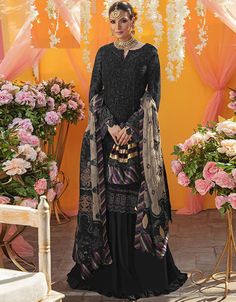 Black Lehenga style Salwar Kameez Georgette Salwar Kameez in Embroidered, Stones & Lace Work:Arabic Attire #frocksalwarsuit #onlinesuitsforwomens #frocksuitwithsalwar #kurtasalwar #onlinesuitshopping #salwars #whatisasalwarkameez #suitforladies #salwarkameezsale #suitdesigner #longsuitsforwomen #salwarkhameezpatterns #suitslady #salwarkameezpatern #salwarkamizpattern #buychuridarsuitonline #salwaarkameezpatterns #salwarkamizpatterns #womensuitsonline #salwarsuitsonline Luxury Black Salwar Kameez With Zari Work, Luxury Black Art Silk Salwar Kameez, Luxury Black Long Sleeve Salwar Kameez, Luxury Black Naqshi Salwar Kameez, Luxury Black Salwar Kameez For Festivals, Luxury Black Cambric Salwar Kameez, Satin Salwar Kameez, Black Salwar Kameez, Black Lehenga