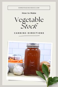 a mason jar filled with vegetables next to some garlic and carrots