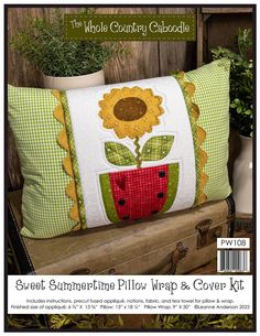 a pillow with a sunflower on it and the words sweet summertime pillow wrap & cover kit