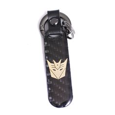 Product Informations Package Included 1Pc Transformers Decepticons Keychain    Description Material:  Zinc alloy+Carbon fiber Color:  Black Carbon Fiber+Gold Logo Size: 4.53"x0.91"x0.08" (115mmx23mmx2mm) Features: Made by  zinc alloy+carbon fiber,Longlife! It's also a good Gift to Children,Family,Friends! Note:  This keychain is for decorative purposes only.  All manufacturer names, symbols, and descriptions are solely used for identification purposes only. Product Shipping 1.    WORLDWIDE SHIPPING.    (Except some countries and APO/FPO)    2. Orders processed timely after the payment verification.    3. We only ship to confirmed order addresses. Your order address MUST MATCH your Shipping address.    4. SERVICE TRANSIT TIME is provided by the carrier and excludes weekends and holidays. Tr Transformers Decepticons, Ring Keychain, Carbon Black, Automotive Accessories, Gold Logo, Key Fobs, Key Ring, Key Rings, Transformers