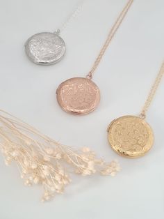 Antique and vintage inspired silver, gold or rose gold plated round floral embossed locket engraved with flying birds on the back of the locket.   Pictures can be added to both sides - see video tutorial https://www.wikihow.com/Put-a-Picture-in-a-Locket    Lovely bridesmaid gift, perfect for a keepsake gift. Simple and elegant. Locket measures 25mm and hangs on a fine silver, gold or rose gold plated chain. Necklaces will arrive in a bag ready for giving. Rose Gold Locket Necklace With Round Pendant, Rose Gold Round Locket Necklace, Vintage Round Disc Necklace For Gift, Vintage Round Disc Necklace As Gift, Wedding Locket Necklace With Adjustable Chain And Round Pendant, Round Locket Necklace With Adjustable Chain For Wedding, Engraved Round Pendant Necklaces For Bridesmaid Gift, Engraved Necklaces For Bridesmaid Gift, Round Charm Necklaces For Bridesmaid Gift