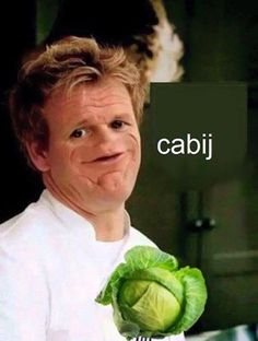 a man holding a head of lettuce with the caption cabji on it