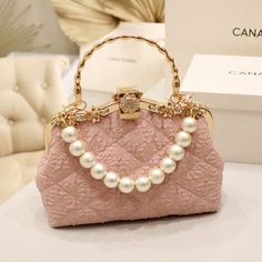 Brand Name: Kylethomasw Handbags Type: TotesMain Material: PolyesterLining Material: PolyesterShape: Square Pink Luxury Mobile Phone Bag, Formal Pink Crossbody Shoulder Bag, Pink Handheld Shoulder Bag With Detachable Strap, Pink Crossbody Shoulder Bag For Party, Pink Shoulder Bag With Single Strap, Pink Crossbody Evening Bag With Detachable Strap, Elegant Pink Satchel With Mobile Phone Bag, Pink Rectangular Bag With Single Shoulder Strap, Trendy Pink Bag With Pearl Handle