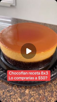 a chocolate cheesecake on a black plate with an orange sauce in the middle and text that reads chocoflan receta 8x 3 x3, lo compararas a $ 50?