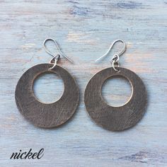 "Bold leather circle earrings perfect for everyday. These earrings feature nickel, english tan or expresso leather paired with simple ear wires in antique brass, antique silver, or antique copper. Lightweight and easy to wear - you might forget you are wearing them! I use only genuine U.S. tanned leather from either Horween (Chicago) or Wickett and Craig (Pennsylvania). The leather will age beautifully and develops fabulous character over time. And these are the same leathers I use in my single Handmade Minimalist Leather Earrings, Minimalist Brown Hoop Earrings For Everyday, Everyday Brown Metal Earrings, Minimalist Leather Earrings For Everyday, Minimalist Brown Brass Jewelry, Brown Nickel-free Hoop Earrings For Everyday, Nickel-free Brown Hoop Earrings For Everyday, Minimalist Nickel-free Brown Earrings, Minimalist Brown Nickel-free Earrings