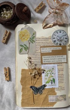 an open book with altered images and flowers on the pages, along with other items