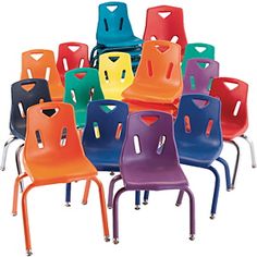 a group of colorful chairs sitting next to each other on top of a white surface