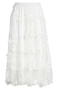 This endlessly enchanting maxi skirt is crafted from luscious chiffon and accented with wispy tulle blooms. Lined 90% polyester, 10% spandex Dry clean Made in the USA Elegant White Floor-length Maxi Skirt, Chic Floor-length Maxi Skirt For Wedding, Elegant Floral Skirt For Spring, Elegant Floral Embellished Skirt For Spring, Elegant Tulle Maxi Skirt For Party, Spring Floor-length Tulle Skirt, Flowy Tiered Maxi Skirt For Wedding, Flowy Floor-length Maxi Skirt For Wedding, White Full Maxi Skirt For Evening