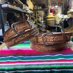 Really nice men's western cowboy belt perfect for any occasion! Artisan engraved leather belt with a rodeo and cowboy design. Has a 1.5 inch width made from 100% genuine leather. Solid finish with stainless steel hardware great for a life lasting touch. Great to combine and style to your preference as well to wear during any activity. Made 100% from Mexico available in all sizes 30-44!  Wondering What Belt Size To Get?  Usually belt sizes are 4 sizes above your pants/ waist size. (Ex): If you ar Cowboy Design, Mens Western, Cowboy Belt, Leather Artisan, Cow Boy, Genuine Leather Belt, Suspender Belt, Western Cowboy, Belt Size