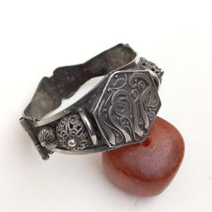 Handmade in Algeria. Gorgeous and rare silver bracelet. With an Algerian stamp and engravings. And in good condition. Bracelet opens at the side. AnD fast shipping *weight: 27.3 gram *The height of the bracelet in the front: 3.3 cm *the height of the bracelet in the back: 1.9 cm If there is any other question send me a message and i will be very happy to answer it as son as possible. Visit my store: https://www.etsy.com/fr/shop/Berberjewelery Engraved Sterling Silver Bracelet For Wedding, Ornate Engraved Sterling Silver Bracelet, Carved Sterling Silver Bracelets, Carved Sterling Silver Bracelet, Ornate Engraved Sterling Silver Ceremonial Bracelet, Ornate Engraved Sterling Silver Bracelet For Ceremonial Occasions, Antique Sterling Silver Bracelet Stamped 925, Ornate Engraved Sterling Silver Bracelet For Ceremonies, Antique Sterling Silver Bracelet For Ceremonial Use