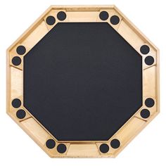 an octagonal wooden frame with black dots on it