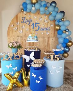 blue and gold birthday party decorations with balloons