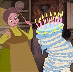 an animated woman blowing out candles on a birthday cake