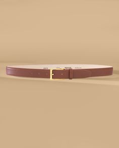 Handcrafted in Italy⁣ Genuine full-grained Italian leather⁣ Velvety Nubuck leather lining⁣ Timeless 24k gold tone buckle ⁣ Adjustment: 5 holes⁣ Strap Width: 1" (3 cm) ⁣ ⁣ Sizing: Measurement is taken from the buckle point to the center hole⁣XXS: 27”⁣ (jean size 22-24)XS/S: 31”⁣ (jean size 25-27)M/L: 35”⁣ (jean size 28-30) Leather Belts With Gold-tone Rectangular Buckle, Luxury Cognac Belt For Formal Occasions, Luxury Brown Belt For Formal Occasions, Brown Luxury Formal Belt, Designer Brown Belt For Formal Occasions, Classic Belts With Gold-tone Hardware For Office, Formal Leather Belt With Gold-tone Hardware, Luxury Brown Calf Leather Belt, Classic Brown Belts For Office