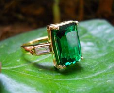 *Material92.5 Sterling Silver *gemstoneNatural Tourmaline *Stone shape   Cushion Cut *gemstone Color... ..Green Color *Gemstone Size10x14 MM *stone weight6.50 carat *Band Colour22k Gold Plated *Ring For Women &Men(Unisex) *Handmade Ring *Please feel free to contact me, I'm very happy to solve your question.          Thank you! Gift Emerald Tourmaline Ring With Accent Stones, Emerald Tourmaline Ring With Accent Stones As Gift, Tourmaline Emerald Ring For May Birthstone Gift, Tourmaline Emerald Ring With Gemstone Accents As Gift, Tourmaline Emerald Ring With Center Stone As Gift, Birthstone Ring Mothers, Birthstone Rings, Tourmaline Stone, Tourmaline Ring